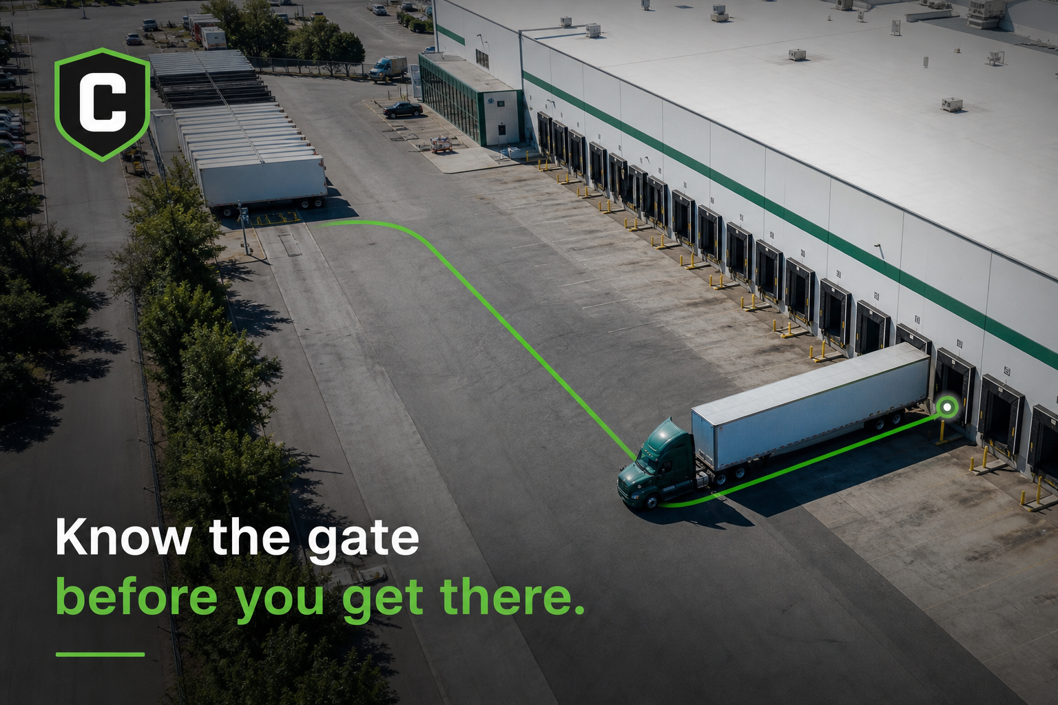 Aerial view of a truck backing into a warehouse loading dock, with Co-Driver's route line showing the gate approach — 'Know the gate before you get there.'